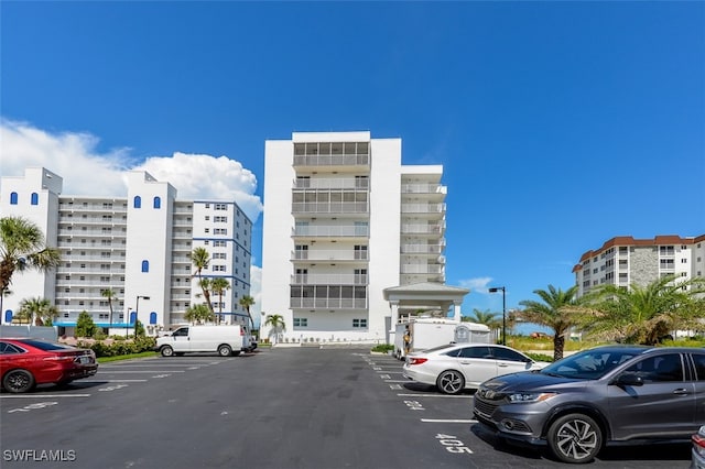 7000 Estero Blvd Unit 205, Fort Myers Beach, FL 33931 - view of apartment building / complex with uncovered parking