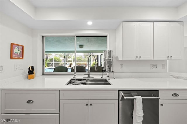 5301 SW 8th Pl, Cape Coral, FL 33914 - kitchen featuring dishwasher, white cabinets, light countertops, and recessed lighting