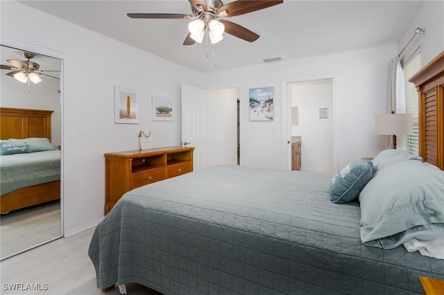 2525 Aspen Creek Ln Unit 202, Naples, FL 34119 - bedroom featuring light wood finished floors and ceiling fan