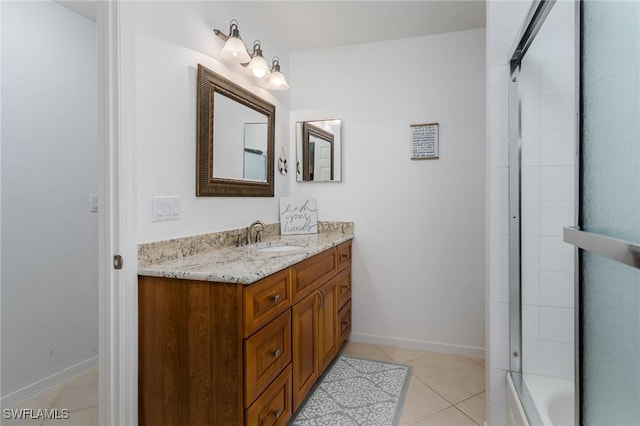 2525 Aspen Creek Ln Unit 202, Naples, FL 34119 - bathroom with vanity, tile patterned flooring, and shower / bath combination