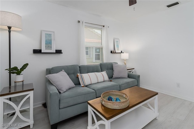 2525 Aspen Creek Ln Unit 202, Naples, FL 34119 - living area with wood finished floors and ceiling fan