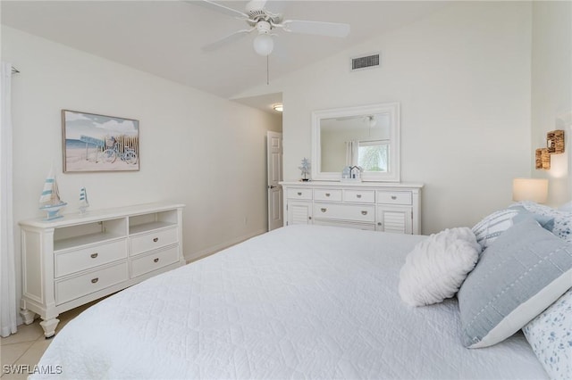 2525 Aspen Creek Ln Unit 202, Naples, FL 34119 - bedroom with lofted ceiling, light tile patterned floors, and a ceiling fan