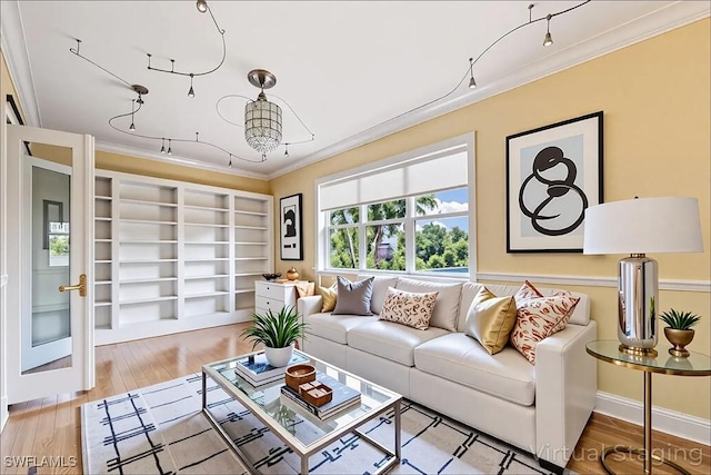 6912 Anthurium Ln, Naples, FL 34113 - living area with crown molding and wood finished floors