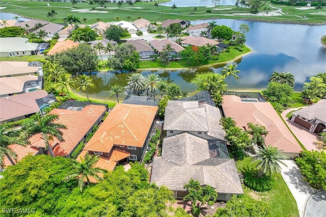 6912 Anthurium Ln, Naples, FL 34113 - aerial perspective of suburban area with a nearby body of water and a golf club