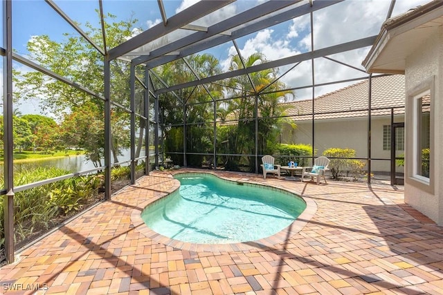 6912 Anthurium Ln, Naples, FL 34113 - outdoor pool featuring a patio and a lanai