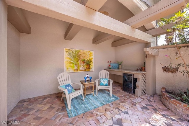 6912 Anthurium Ln, Naples, FL 34113 - view of patio / terrace featuring wine cooler
