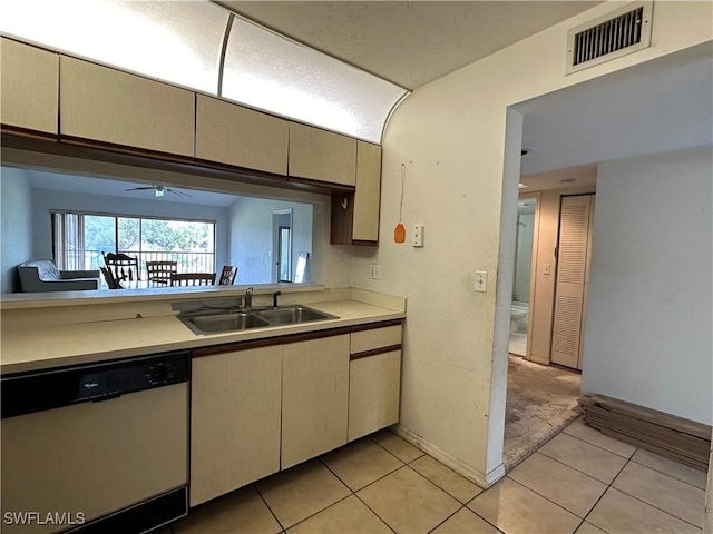 1224 Commonwealth Cir Unit N-203, Naples, FL 34116 - kitchen featuring dishwashing machine, light countertops, cream cabinets, light tile patterned flooring, and ceiling fan