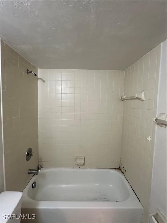 1224 Commonwealth Cir Unit N-203, Naples, FL 34116 - full bathroom with shower / bathtub combination and toilet