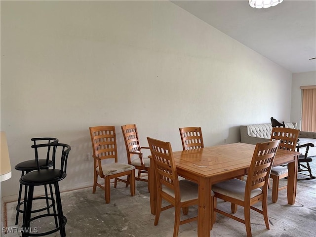 1224 Commonwealth Cir Unit N-203, Naples, FL 34116 - dining area featuring lofted ceiling
