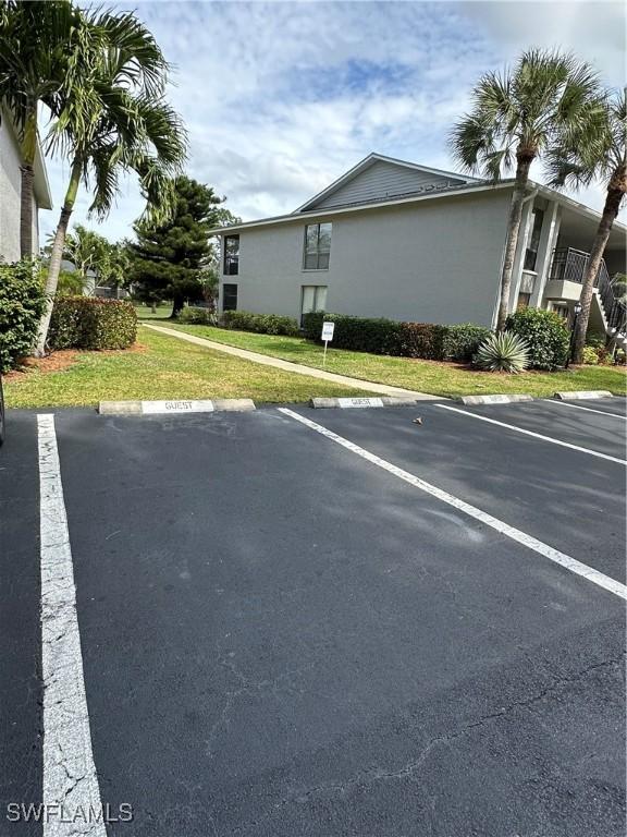 1224 Commonwealth Cir Unit N-203, Naples, FL 34116 - view of uncovered parking lot