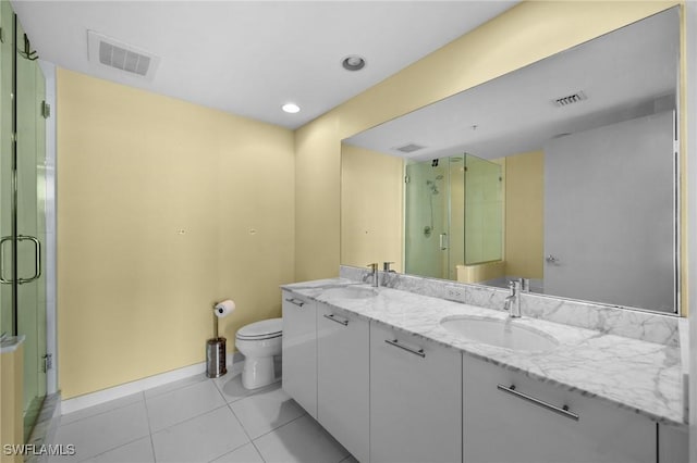3000 Oasis Grand Blvd Unit 906, Fort Myers, FL 33916 - bathroom featuring double vanity, a shower stall, and tile patterned floors