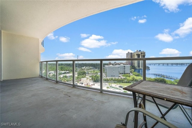3000 Oasis Grand Blvd Unit 906, Fort Myers, FL 33916 - balcony with a city view and a water view