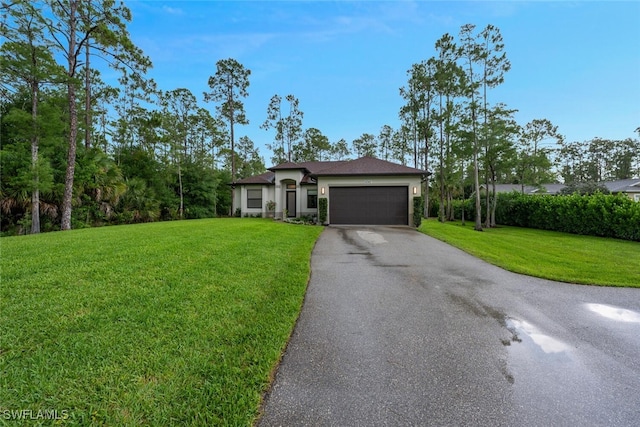 4345 6th Ave NE, Naples, FL 34120 - ranch-style home with asphalt driveway, a garage, a front yard, and stucco siding