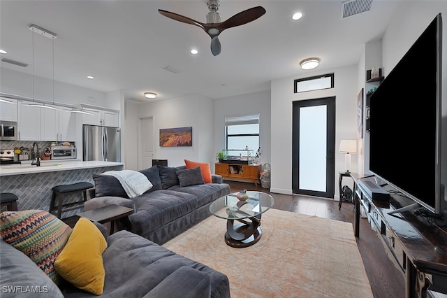4345 6th Ave NE, Naples, FL 34120 - living room featuring dark wood-style flooring, recessed lighting, and ceiling fan