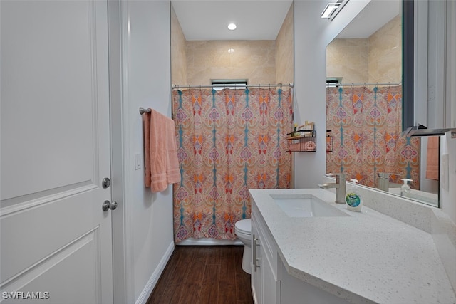 4345 6th Ave NE, Naples, FL 34120 - full bathroom with vanity, wood finished floors, and curtained shower