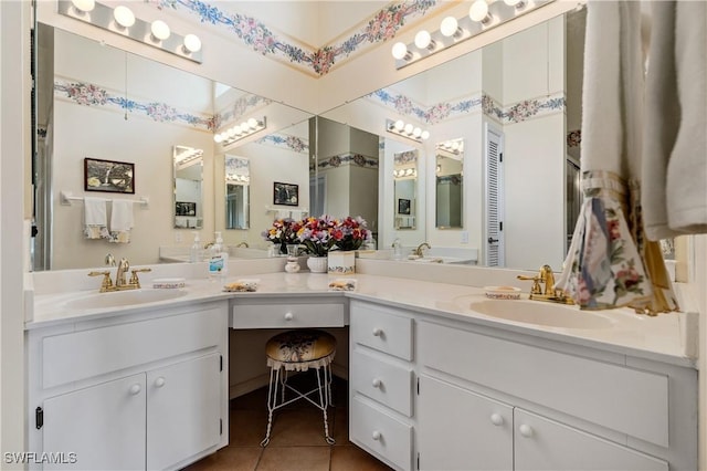 17770 Pineapple Palm Ct, North Fort Myers, FL 33917 - bathroom with double vanity and tile patterned floors