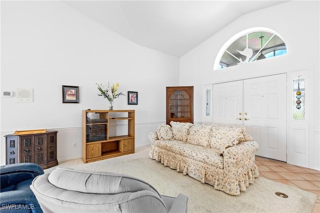 17770 Pineapple Palm Ct, North Fort Myers, FL 33917 - living area featuring high vaulted ceiling and tile patterned floors