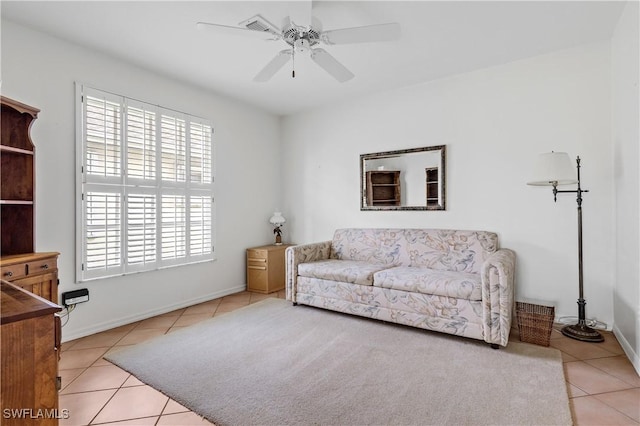 17770 Pineapple Palm Ct, North Fort Myers, FL 33917 - living room with light tile patterned flooring and a ceiling fan