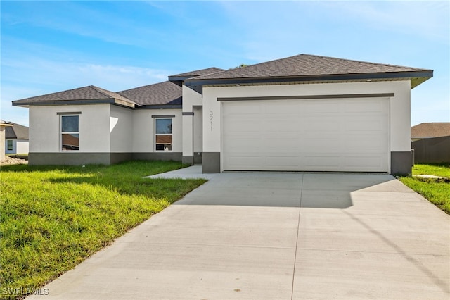 3211 8th St W, Lehigh Acres, FL 33971 - view of front of home featuring stucco siding, driveway, an attached garage, a front lawn, and roof with shingles
