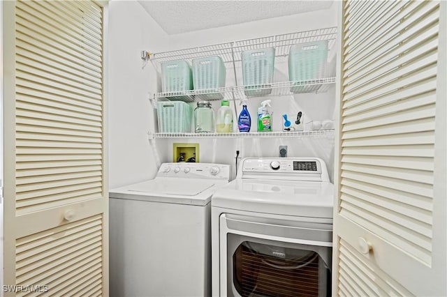 240 Pebble Beach Cir Unit F206, Naples, FL 34113 - laundry area with washer and dryer