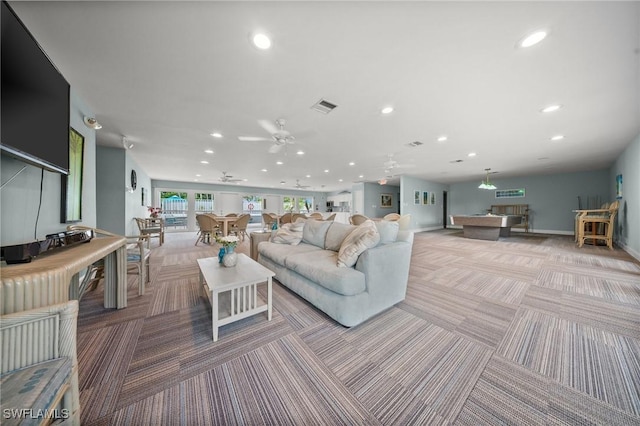 4251 Island Cir Unit 3, Fort Myers, FL 33919 - living room with light carpet, recessed lighting, and a ceiling fan