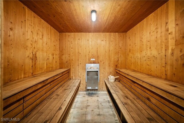 4251 Island Cir Unit 3, Fort Myers, FL 33919 - relaxing sauna featuring wood ceiling, wood walls, and hardwood / wood-style flooring