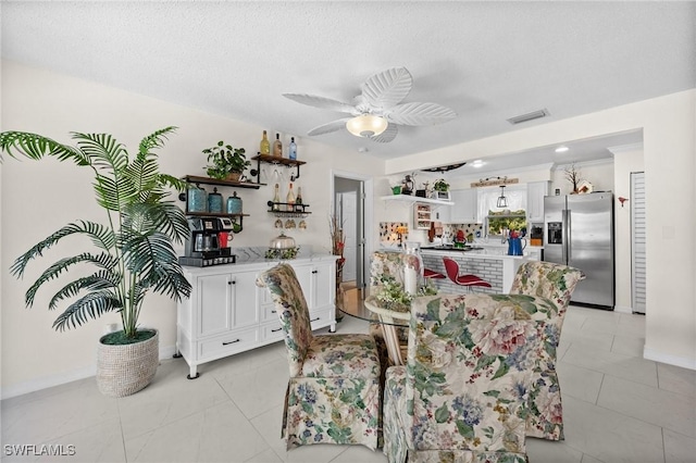 4251 Island Cir Unit 3, Fort Myers, FL 33919 - dining area featuring light tile patterned floors, ceiling fan, and a textured ceiling