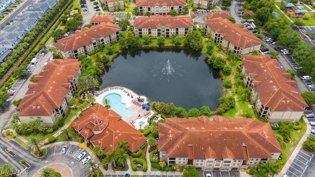 12970 Positano Cir Unit 301, Naples, FL 34105 - bird's eye view of a pool and a large body of water