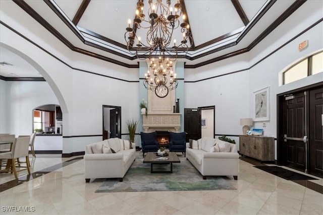 12970 Positano Cir Unit 301, Naples, FL 34105 - community lobby featuring crown molding and a towering ceiling