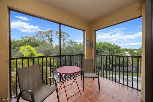 12970 Positano Cir Unit 301, Naples, FL 34105 - sunroom with plenty of natural light