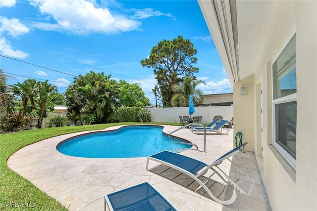 636 98th Ave N, Naples, FL 34108 - view of swimming pool featuring a fenced backyard and a patio