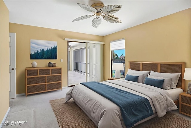 4210 SE 20th Pl Unit C2, Cape Coral, FL 33904 - bedroom with access to outside, light carpet, and ceiling fan