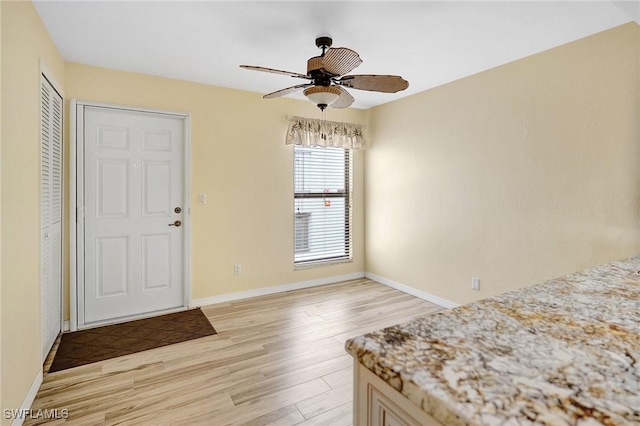 4210 SE 20th Pl Unit C2, Cape Coral, FL 33904 - entryway with light wood-type flooring and a ceiling fan