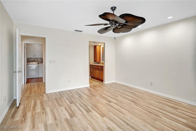 4210 SE 20th Pl Unit C2, Cape Coral, FL 33904 - unfurnished bedroom featuring light wood-style flooring, washing machine and dryer, recessed lighting, connected bathroom, and ceiling fan