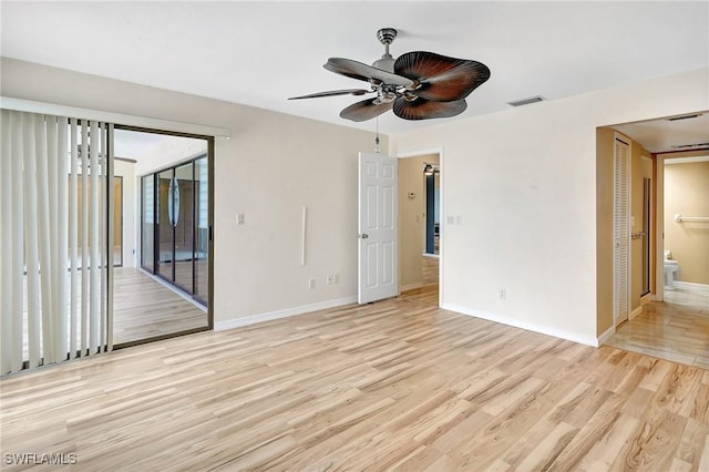 4210 SE 20th Pl Unit C2, Cape Coral, FL 33904 - empty room with light wood finished floors and ceiling fan