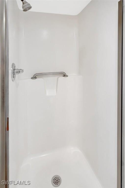 4210 SE 20th Pl Unit C2, Cape Coral, FL 33904 - full bathroom featuring a shower