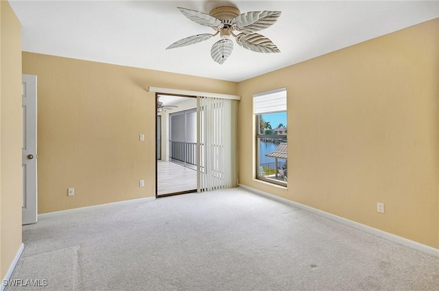 4210 SE 20th Pl Unit C2, Cape Coral, FL 33904 - empty room with ceiling fan and carpet flooring