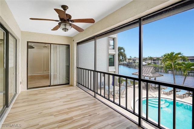4210 SE 20th Pl Unit C2, Cape Coral, FL 33904 - unfurnished sunroom featuring healthy amount of natural light and a water view