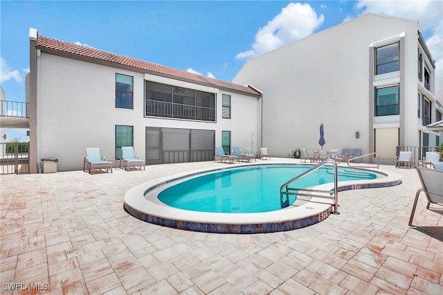 4210 SE 20th Pl Unit C2, Cape Coral, FL 33904 - community pool featuring a patio