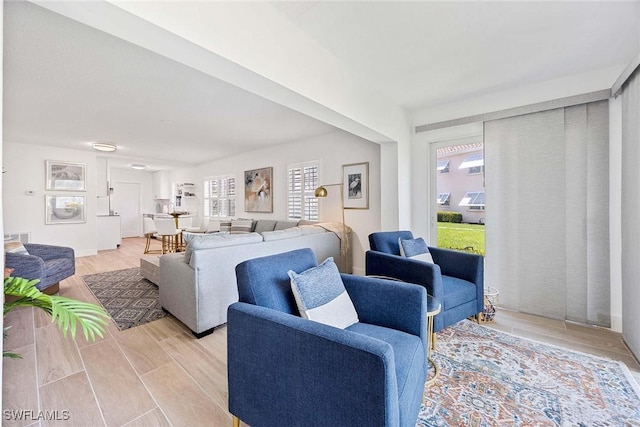 3070 Gulf Shore Blvd N Unit 104, Naples, FL 34103 - living area featuring light wood finished floors