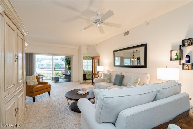 13221 Sherburne Cir Unit 601, Bonita Springs, FL 34135 - living room featuring light carpet and ceiling fan
