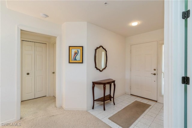 13221 Sherburne Cir Unit 601, Bonita Springs, FL 34135 - entrance foyer with baseboards