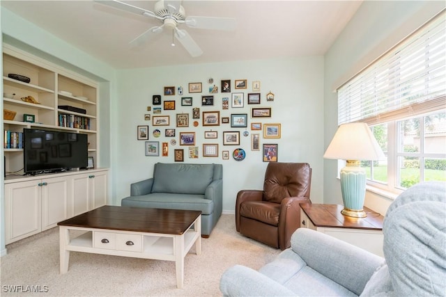 13221 Sherburne Cir Unit 601, Bonita Springs, FL 34135 - living area with ceiling fan and light carpet