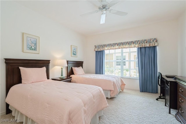 13221 Sherburne Cir Unit 601, Bonita Springs, FL 34135 - bedroom with light carpet and ceiling fan