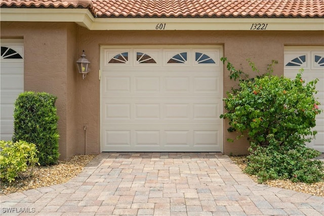 13221 Sherburne Cir Unit 601, Bonita Springs, FL 34135 - garage with driveway