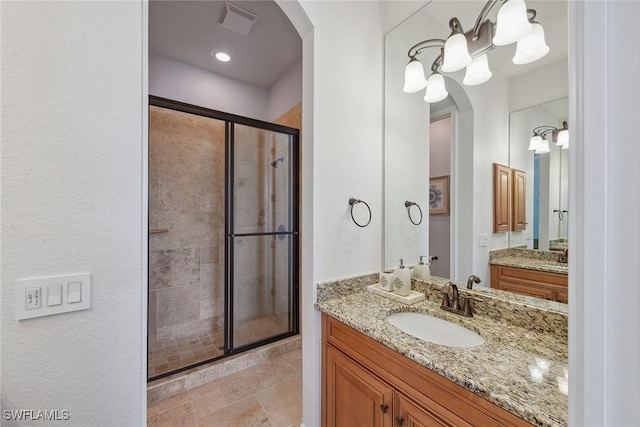 3441 Runaway Ln, Naples, FL 34114 - bathroom featuring a stall shower and vanity