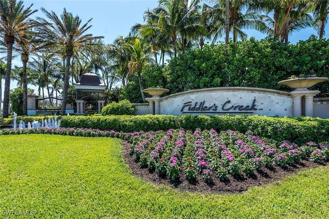 3441 Runaway Ln, Naples, FL 34114 - community sign with a yard