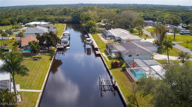 1721 Cascade Way N, Fort Myers, FL 33917 - aerial perspective of suburban area featuring a nearby body of water and a forest