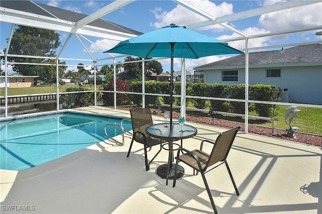 1721 Cascade Way N, Fort Myers, FL 33917 - swimming pool with a patio area and glass enclosure