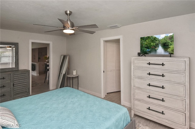 1721 Cascade Way N, Fort Myers, FL 33917 - bedroom featuring light wood finished floors and a ceiling fan